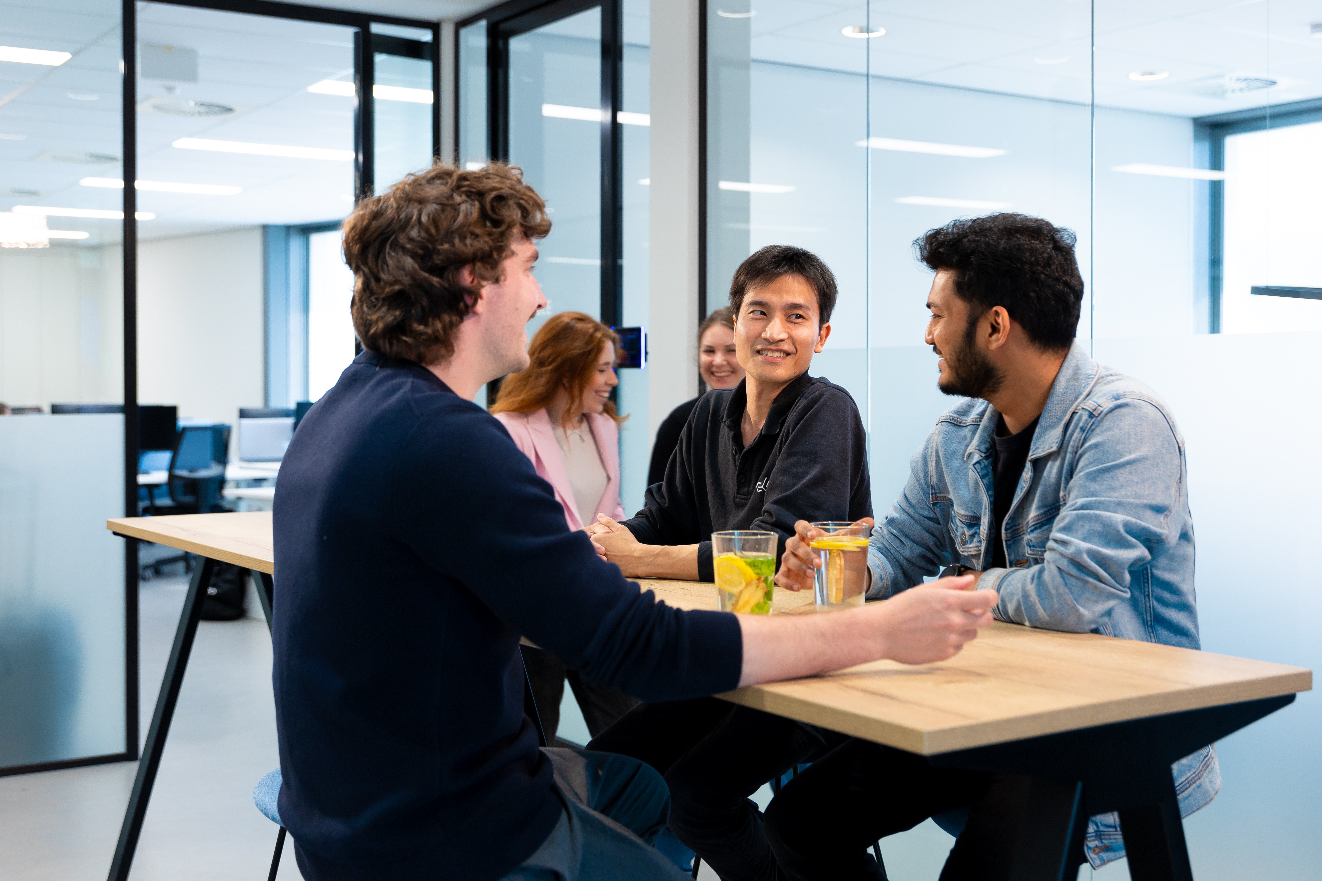 Eleo Team Collaborating Around a Table